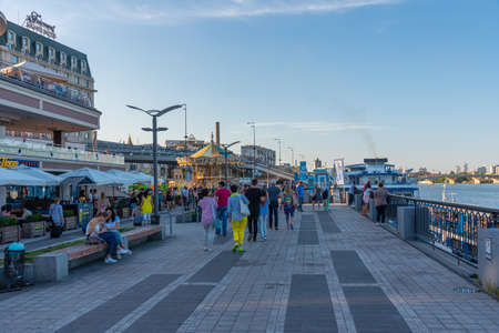 KYIV, UKRAINE, AUGUST 29, 2019: People are walking on riverside of Dnieper in Kyiv, Ukraineのeditorial素材