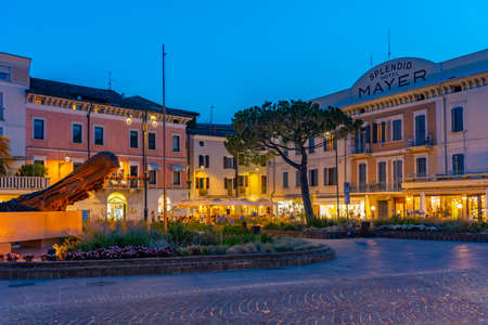 DESENZANO DEL GARDA, ITALY, JULY 23, 2019: Dinenr time at Desenzano del Garda in Italyのeditorial素材