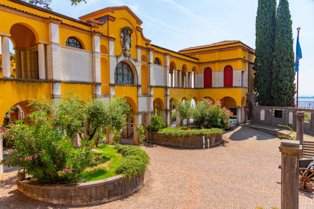 GARDONE RIVIERA, ITALY, JULY 23, 2019: Vittoriale degli italiani palace at Gardone Riviera in Italyのeditorial素材