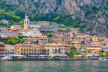 LIMONE SUL GARDA, ITALY, JULY 22, 2019: Lakeside promenade at Limone sul Garda in Italyのeditorial素材