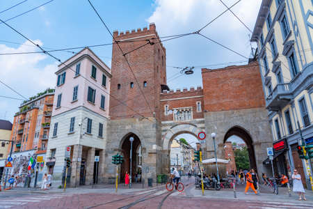 MILANO, ITALY, JULY 19, 2019: People are passing porta ticinese in Milano, Italyのeditorial素材