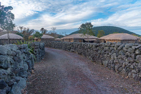 Traditional buildings at Jeju Stone park in Republic of Koreaのeditorial素材