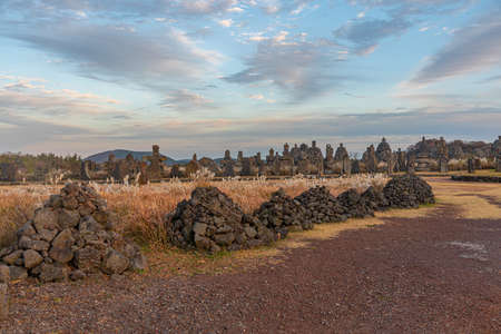 Dongjasok - stone guardians at Jeju stone park, republic of Koreaのeditorial素材