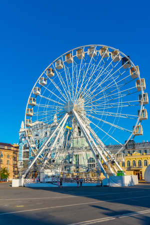 KYIV, UKRAINE, AUGUST 28, 2019: Ferris wheel at Kontraktova square in Kyiv, Ukraineのeditorial素材