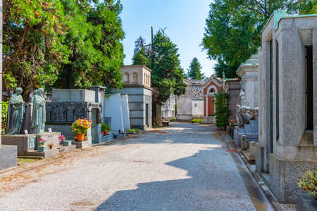 MILANO, ITALY, JULY 19, 2019: Decorated graves at Cimitero Monumentale cemetery in Milano, Italyのeditorial素材