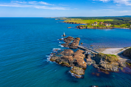 Lighthouse on a rocky islet in Ahtopol, Bulgariaの写真素材