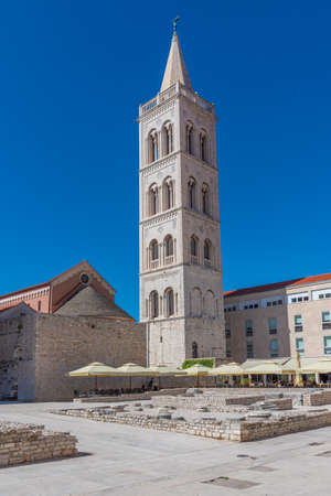 Bell tower between Saint Donatus church and Saint Anastasia cathedral in Zadar, Croatiaの写真素材