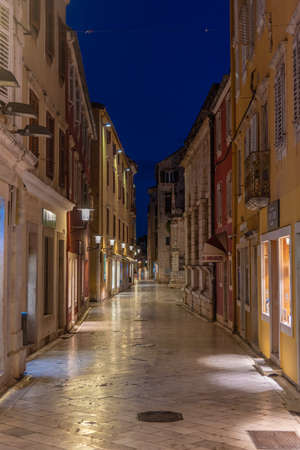 Sunrise view of a pedestrian street in the old town of Zadar, Croatiaの写真素材