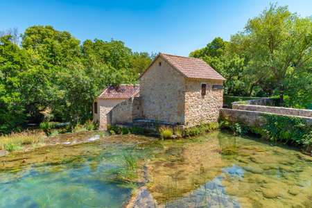 Water mill at Krka national park in Croatiaの写真素材