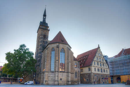 Sunset view of Stiftskirche at Schillerplatz square in Stuttgart, Germanyの写真素材
