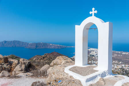 Panorama view of Oia from caldera hiking trail, Santorini, Greeceの写真素材
