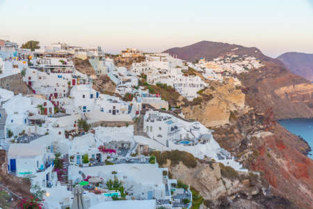 Sunset panorama of Oia at Santorini island, Greece