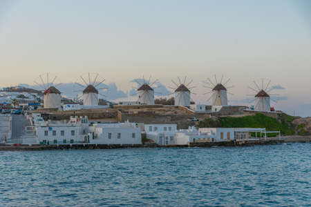 Windmills overlooking aegean sea at Mykonos, Greece