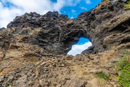 Rock window at Dimmuborgir lava field situated on Icelandの写真素材
