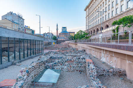 Sofia, Bulgaria, June 3, 2020: Banya Bashi mosque viewed behind roman ruins in Sofia, Bulgaria