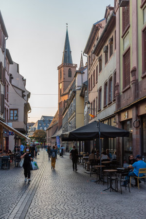 Strasbourg, France, September 21, 2020: People are strolling through a narrow street in the old town of Strasbourg, Franceのeditorial素材