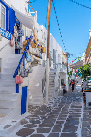 Mykonos, Greece, September 27, 2020: Tourist shops at a narrow street in the old town of Mykonos, Greeceのeditorial素材