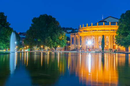 Sunset view of State opera in Stuttgart reflected on water, Germanyのeditorial素材