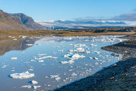 Floating icebergs at Fjallsarlon lagoon on Iceland