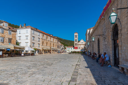 Hvar, Croatia, July 29, 2020: People strolling in front of the Saint Stephen cathedral at Hvar, Croatiaのeditorial素材