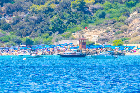 Tourists are enjoying a sunny day at Blue lagoon near Cape Greco on Cyprusのeditorial素材