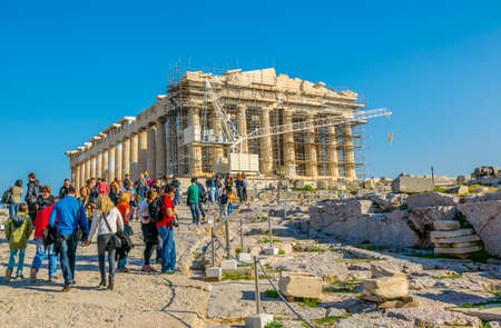 ATHENS, GREECE, DECEMBER 10, 2015: Many tourists visiting ancient temple Parthenon on Acropolis, Athens, Greeceのeditorial素材