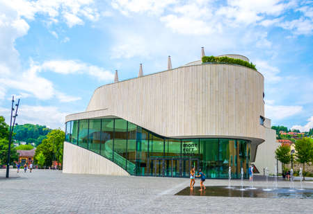 FELDKIRCH, AUSTRIA, JULY 25, 2016: People are walking in front of the montforthaus congress center in the austrian town Feldkirch.のeditorial素材