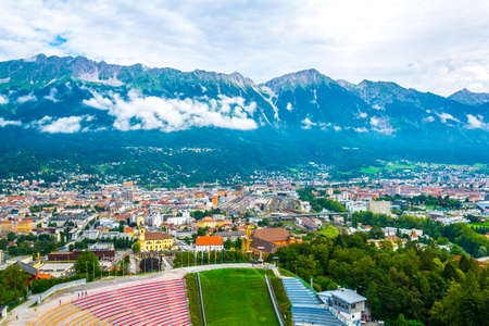 INNSBRUCK, AUSTRIA, JULY 27, 2016: View of the famous Bergisel ski jumping stadium whose most distinctive part - ski jumping tower was designed by famous iraqi architect Zaha Hadid.のeditorial素材