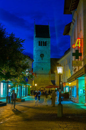 ZELL AM SEE, AUSTRIA, JULY 28, 2016: People are strolling around the St Hippolyte (Hippolitus)...