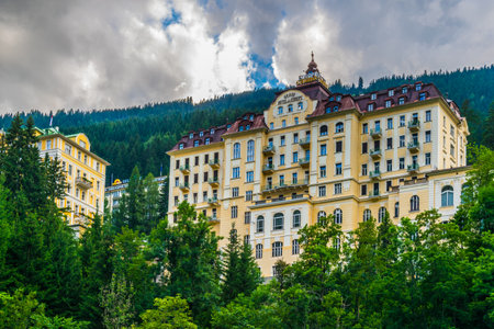 BAD GASTEIN, AUSTRIA, JULY 29, 2016: View of a yellow hotel in the austrian spa and ski resort bad gastein.のeditorial素材