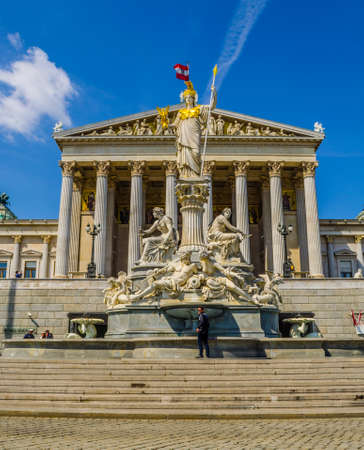 VIENNA, AUSTRIA, MAY 15, 2015: Austrian parliament building with famous Pallas Athena fountain and main entrance in Vienna, Austriaのeditorial素材