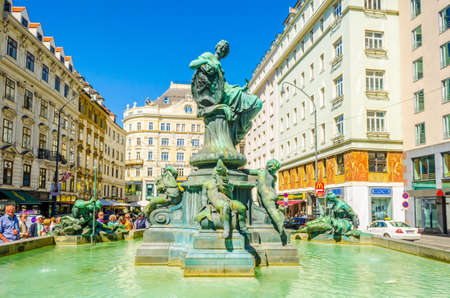 VIENNA, AUSTRIA, JUNE 15, 2015: Very nice fountain with statues and beautiful green water located inner city, Graben areaのeditorial素材