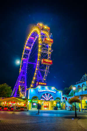 VIENNA, AUSTRIA, JUNE 2016: Night view of the illuminated ferris wheel in the prater amusement park in Vienna, Austria.のeditorial素材