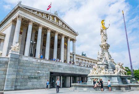 VIENNA, AUSTRIA, JUNE, 2016: people are walking in front of the parliament building in Vienna, Austria.のeditorial素材