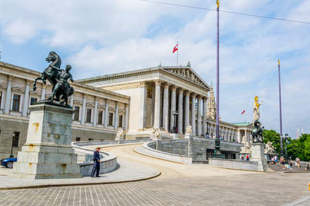 VIENNA, AUSTRIA, JUNE, 2016: people are walking in front of the parliament building in Vienna, Austria.のeditorial素材