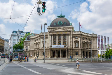VIENNA, AUSTRIA, JUNE, 2016: people are walking in front of the volkstheater building in Vienna, Austria.のeditorial素材