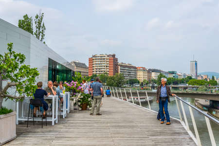 VIENNA, AUSTRIA, JUNE 2016: People are enjoying view of the donau channel from a terrace.のeditorial素材