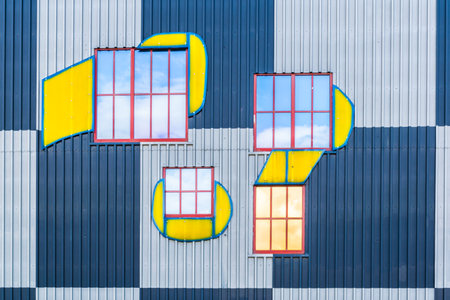 VIENNA, AUSTRIA, MAY 27, 2016: detail of windows and colorful facade of the famous waste incinerator designed by Friedensreich Hundertwasser in Spittelau, Vienna.のeditorial素材