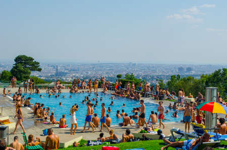VIENNA, AUSTRIA, AUGUST 15, 2015: People are enjoying sunny day swimming at the krapfenwaldbad...