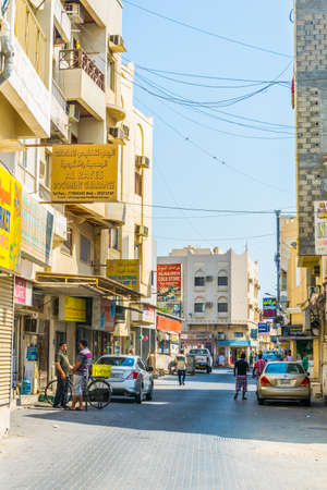 AL MUHARRAQ, BAHRAIN, OCTOBER 23, 2016: View of a shopping street on the Al Muharraq island in Bahrainのeditorial素材