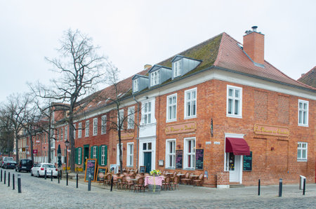 POTSDAM, GERMANY, MARCH 11, 2015: red brick houses are typical for dutch architecture in hollandisches viertel quarter of potsdam, germany. this quarter is full of small shops and restaurants.のeditorial素材