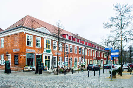 POTSDAM, GERMANY, MARCH 11, 2015: red brick houses are typical for dutch architecture in hollandisches viertel quarter of potsdam, germany. this quarter is full of small shops and restaurants.のeditorial素材