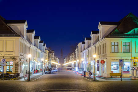 POTSDAM, GERMANY, MARCH 11, 2015: night view of a small square near potsdam where brandenburger strasse reaches famous brandenburger tor.のeditorial素材