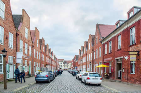 POTSDAM, GERMANY, MARCH 11, 2015: red brick houses are typical for dutch architecture in...