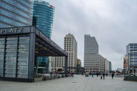 BERLIN, GERMANY, MARCH 12, 2015: people are walking through one of the commerce centers of berlin - potzdamer platz. this square was freshly built after German reunification.のeditorial素材