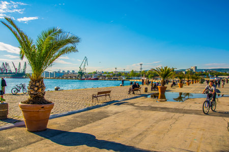 VARNA, BULGARIA, MAY 7, 2016: people are enjoying sunny day on a waterfront of the varna harbor in Bulgaria.のeditorial素材