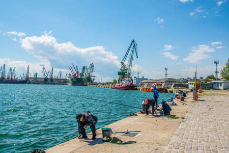 VARNA, BULGARIA, MAY 7, 2016: people are enjoying sunny day on a waterfront of the varna harbor in Bulgaria.のeditorial素材