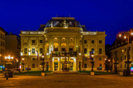BRATISLAVA, SLOVAKIA, MAY 28, 2016: Night view of the illuminated slovakian national theater in Bratislavaのeditorial素材