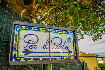 CAPRI, ITALY, MAY 8, 2014: Typical ceramic signs showing direction to the most famous capri destinations.のeditorial素材