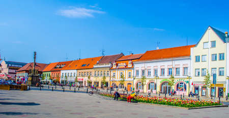 PODEBRADY, CZECH REPUBLIC, APRIL 28, 2015: people are strolling through the main square of czech city podebrady which is dominated by statue of the czech king jiri z podebrad.のeditorial素材